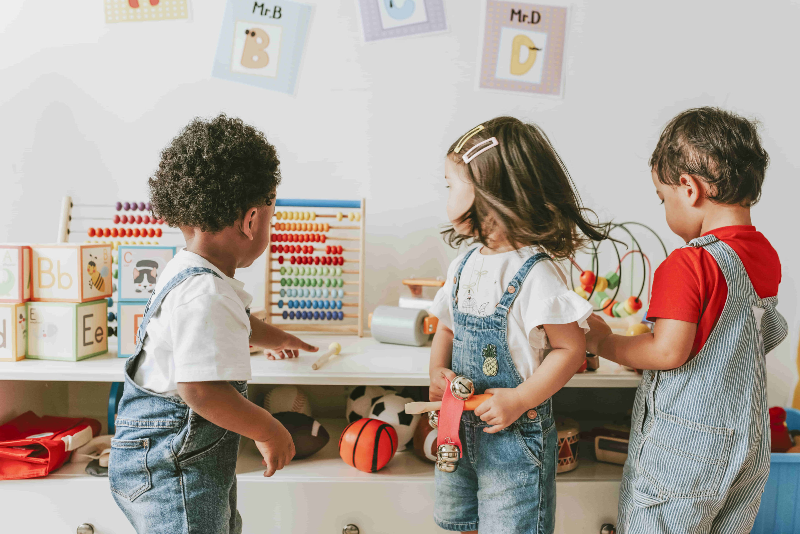 young-children-playing-with-educational-toys-2023-11-27-05-12-59-utc